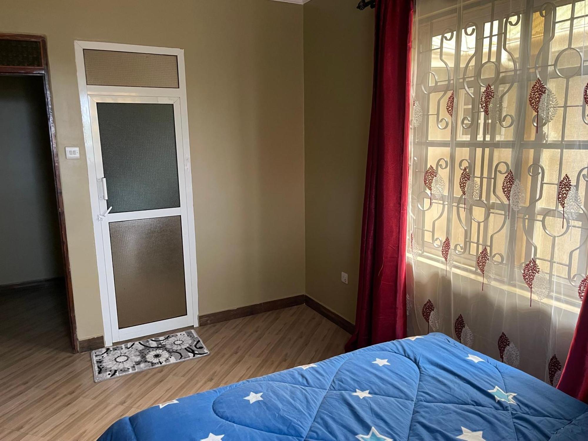 The Golden Suite Apartment 阿鲁沙 外观 照片